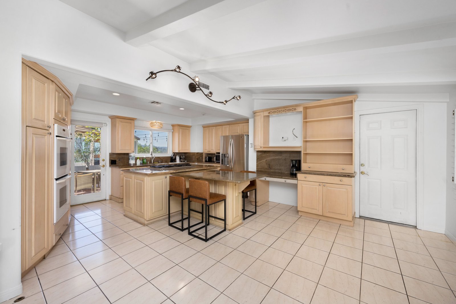 kitchen-with-wooden-cabinets-next-to-window-blinds-2025-02-03-10-36-53-utc-scaled.jpg